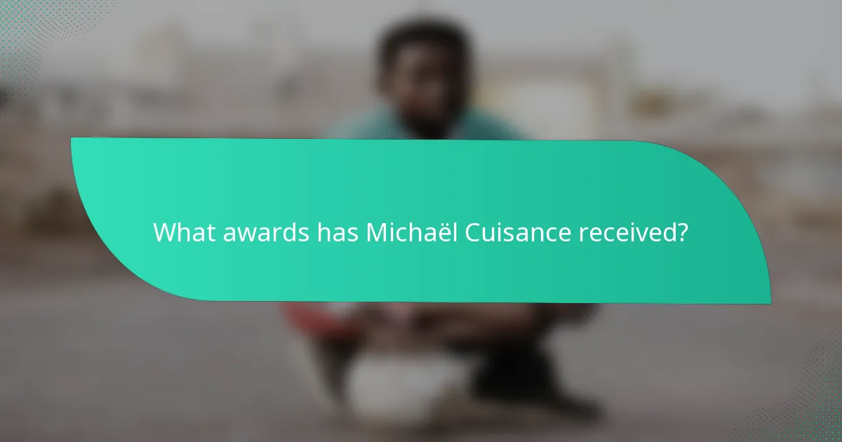 What awards has Michaël Cuisance received?